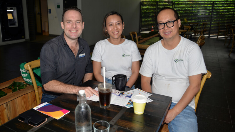 Planning Chair Councillor Jon Raven (left) listens to feedback from Berrinba residents Linda and Phuc Nguyen, who operate Social Sphere Café at Marsden.